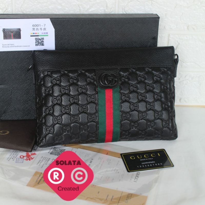 bolsa de mano para hombre gucci