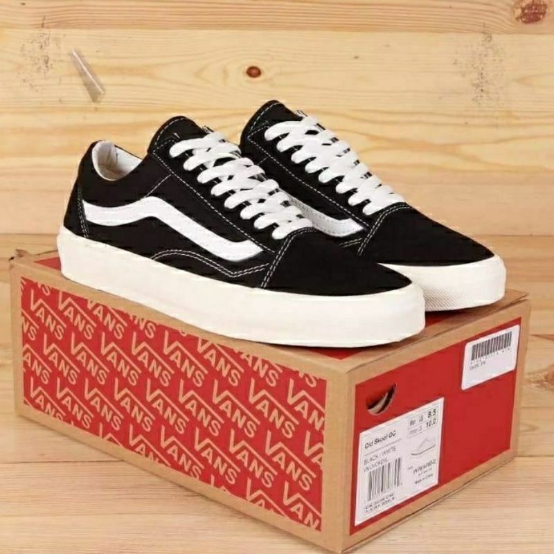 vans negros blanco