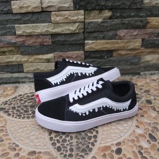 vans negros blanco