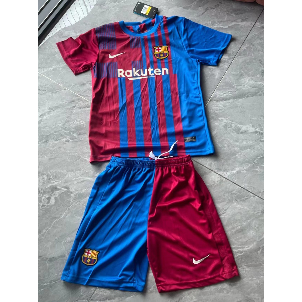 Barcelona Conjunto Camiseta y pantalón Replica 1ª EQ Temporada 2021/22 Producto con Licencia FC Talla niño 6 años 100% Poliéster Dorsal 10 ANSU FATI 